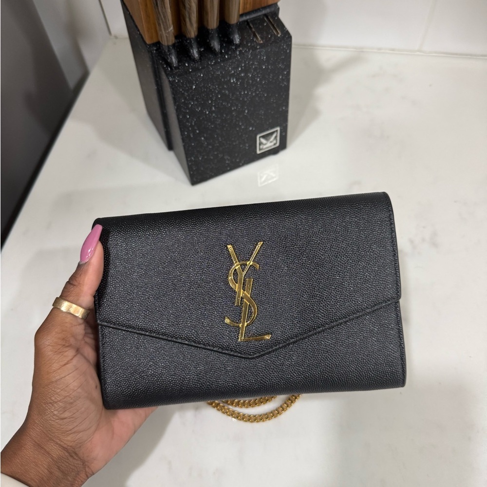 Yves Saint Laurent Black Clutch with Gold Logo